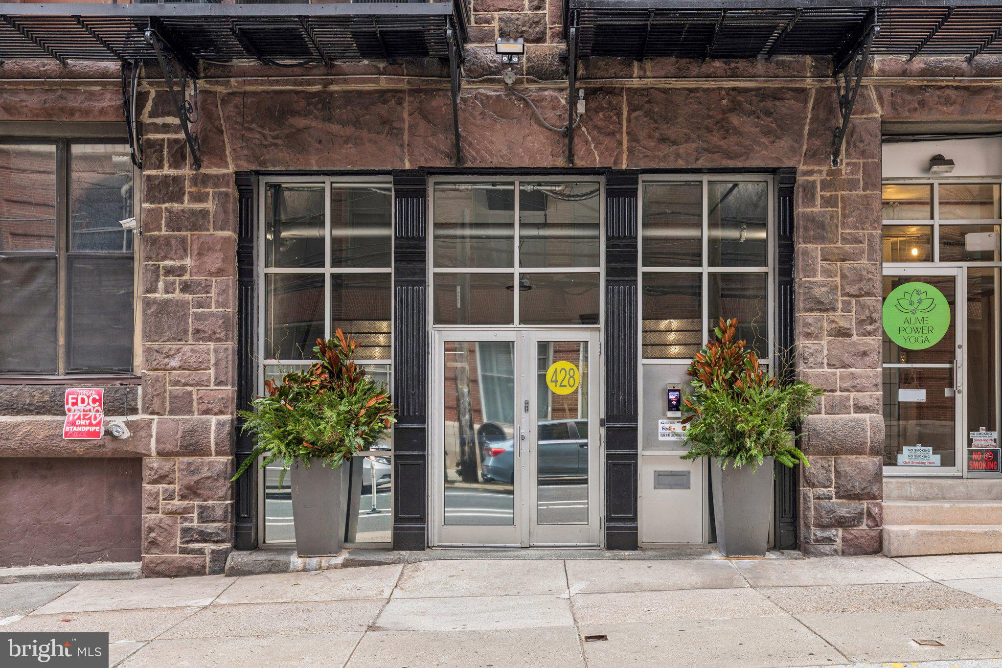 428 North 13th Street, Unit 3F Philadelphia, PA 19123 - Photo 44 of 48 a couple of potted plants in front of door