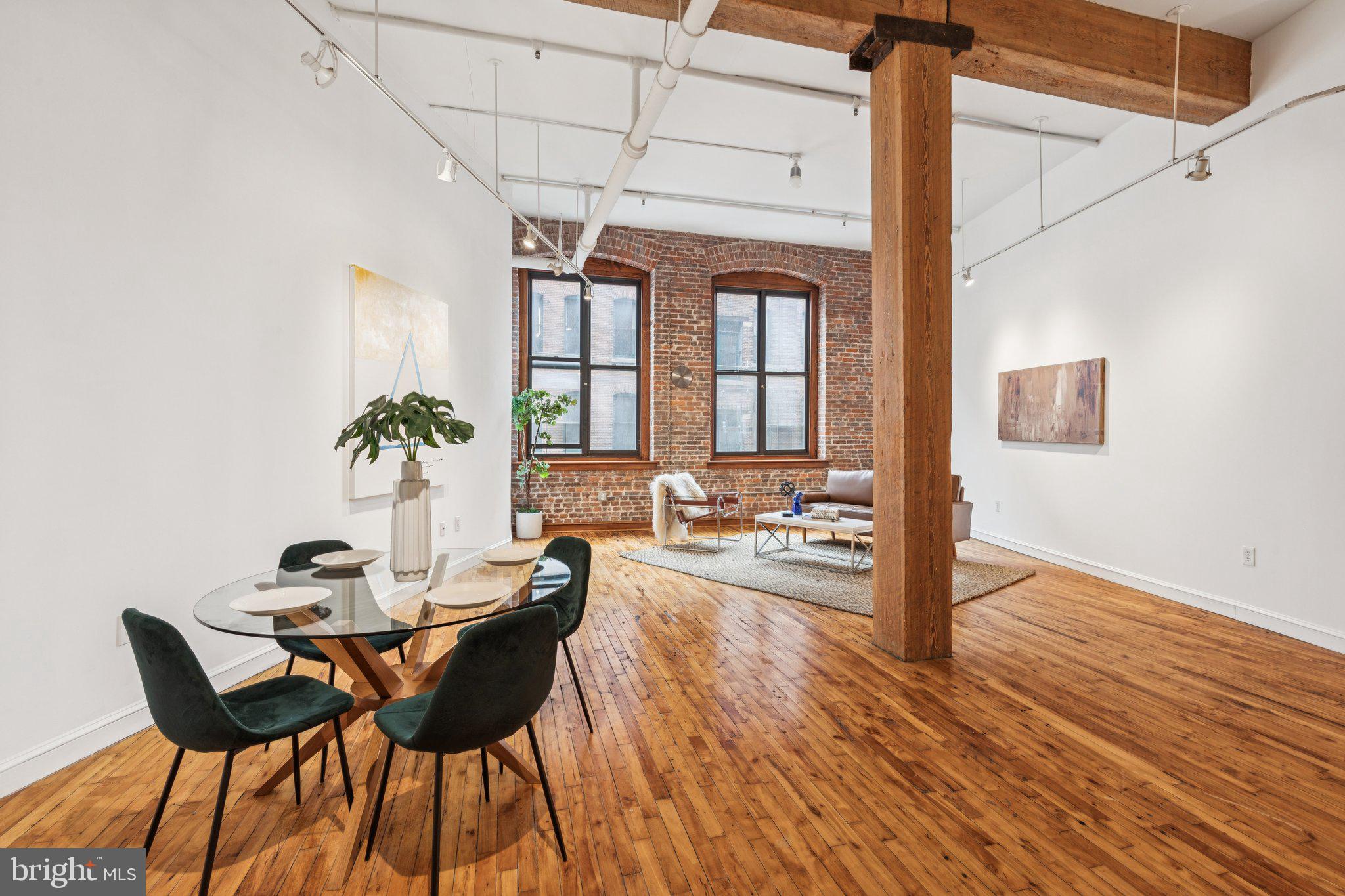 428 North 13th Street, Unit 3F Philadelphia, PA 19123 - Photo 10 of 48 a dining room with furniture and wooden floor