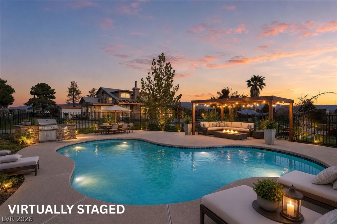 2570 East Kellogg Road Pahrump, NV 89048 - Photo 42 of 60 Virtually Staged pool/lounging area with childs play structure