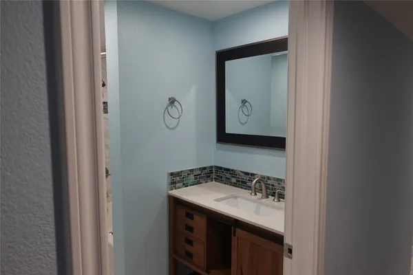 a view of hallway with natural light