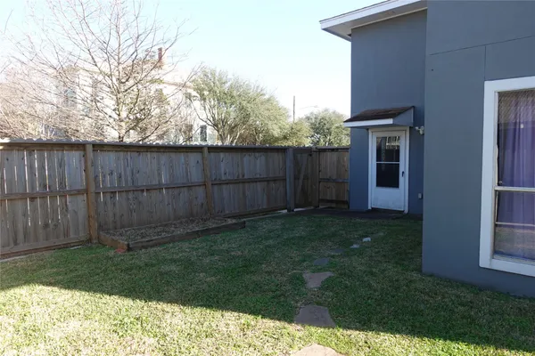a view of an empty room with a garage
