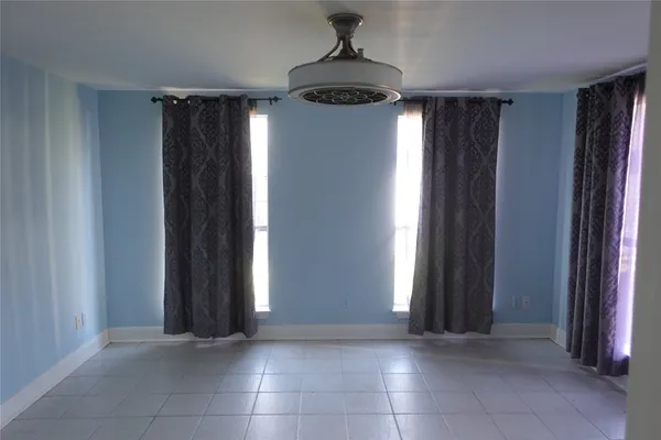 a view of entryway with a front door and windows