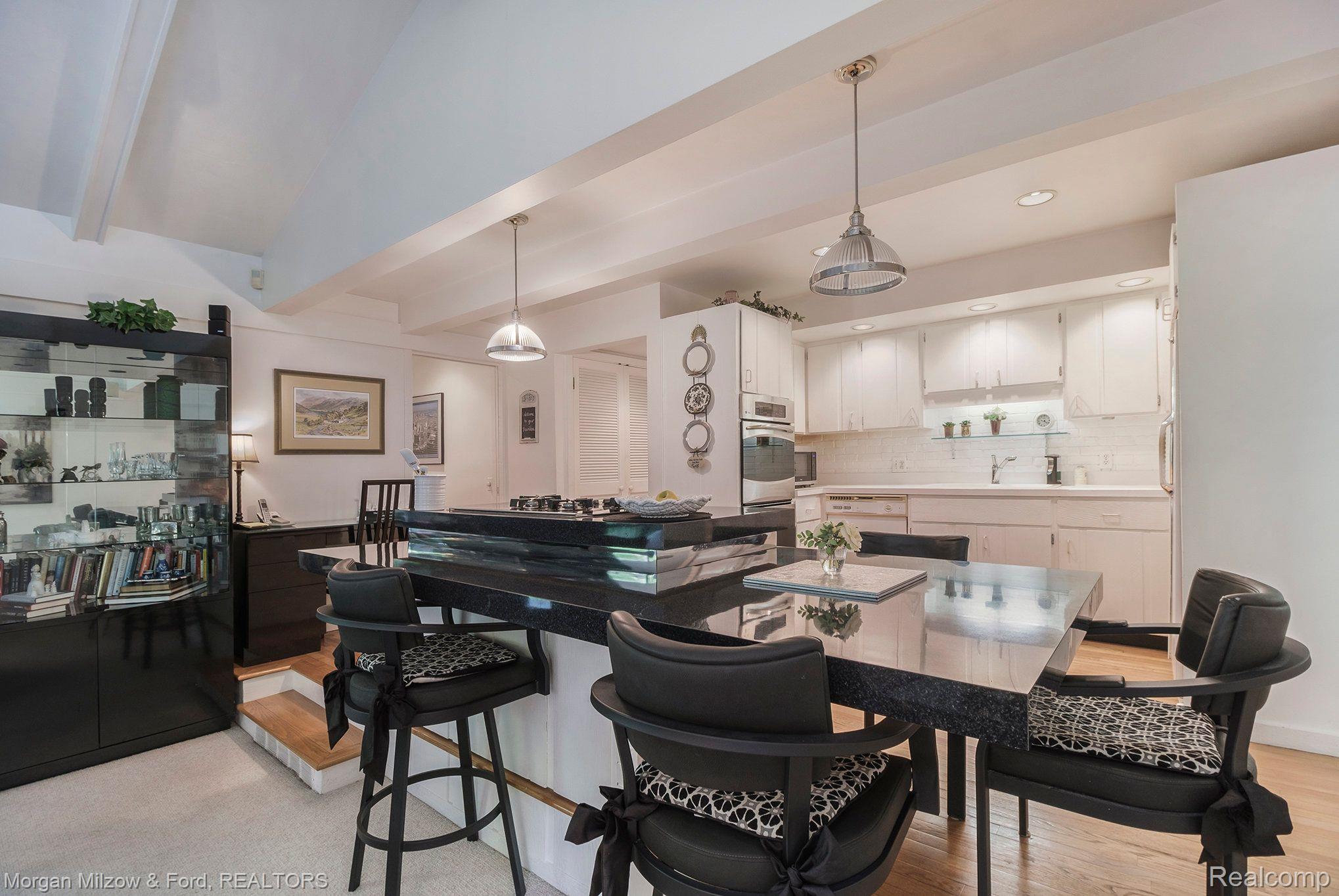 5800 Cobb Creek Road Rochester, MI 48306 - Photo 8 of 36 Island w/ gas cook top & seating