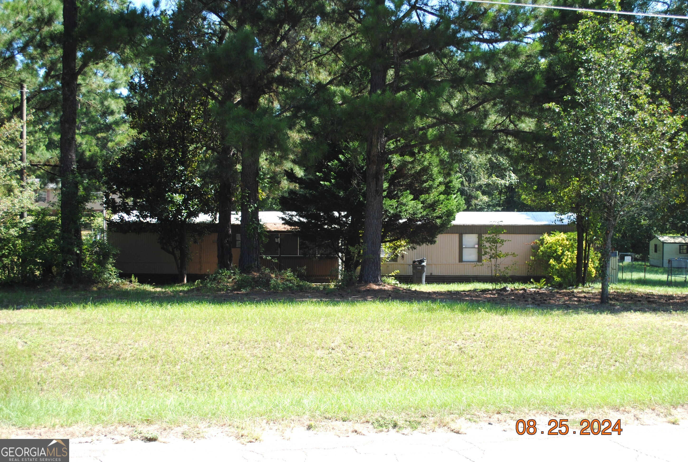 737 Bennock Mill Road Augusta, GA 30906 - Photo 1 of 1 a view of a house with swimming pool and sitting area