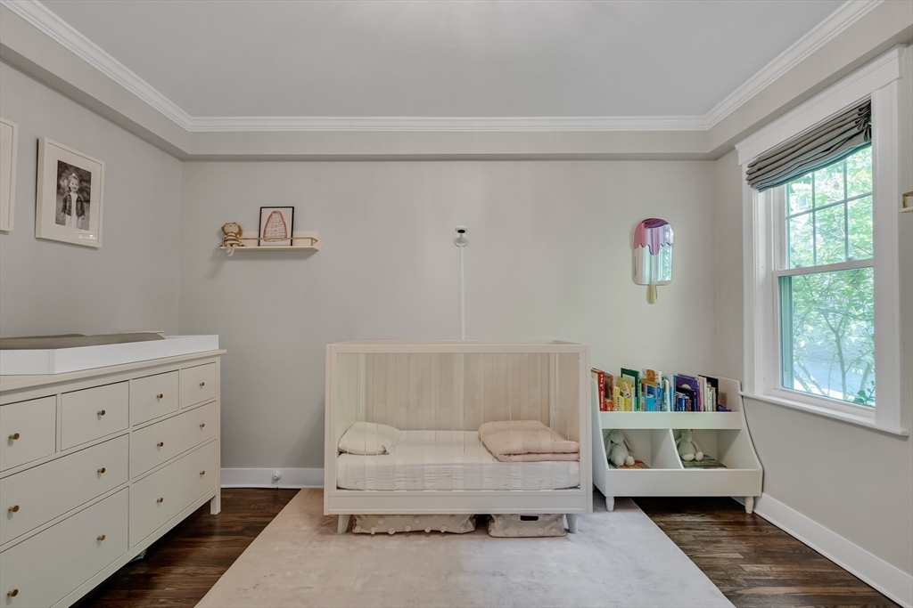 30 Perkins Street, Unit 1 Newton, MA 02465 - Photo 22 of 34 a living room with furniture and a window