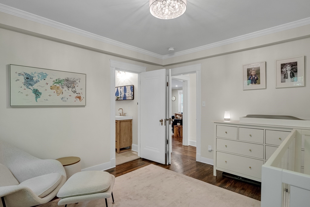 30 Perkins Street, Unit 1 Newton, MA 02465 - Photo 23 of 34 a living room with furniture and wooden floor