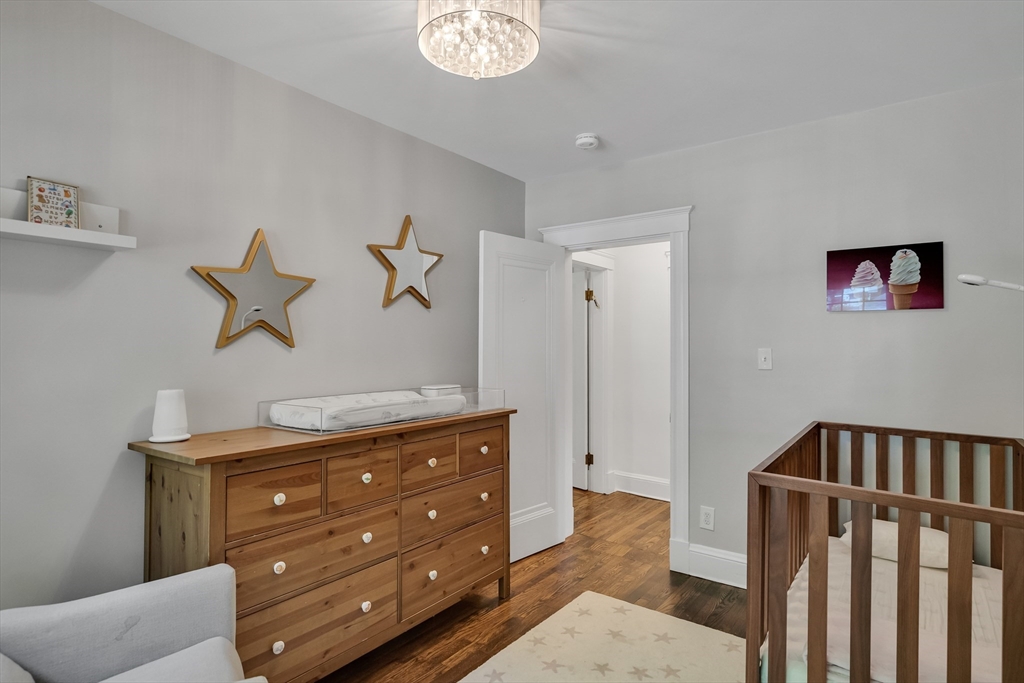 30 Perkins Street, Unit 1 Newton, MA 02465 - Photo 30 of 34 a room with a dresser and a window