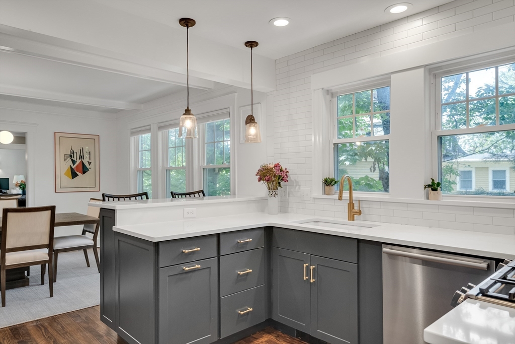 30 Perkins Street, Unit 1 Newton, MA 02465 - Photo 4 of 34 a kitchen with a sink and a window