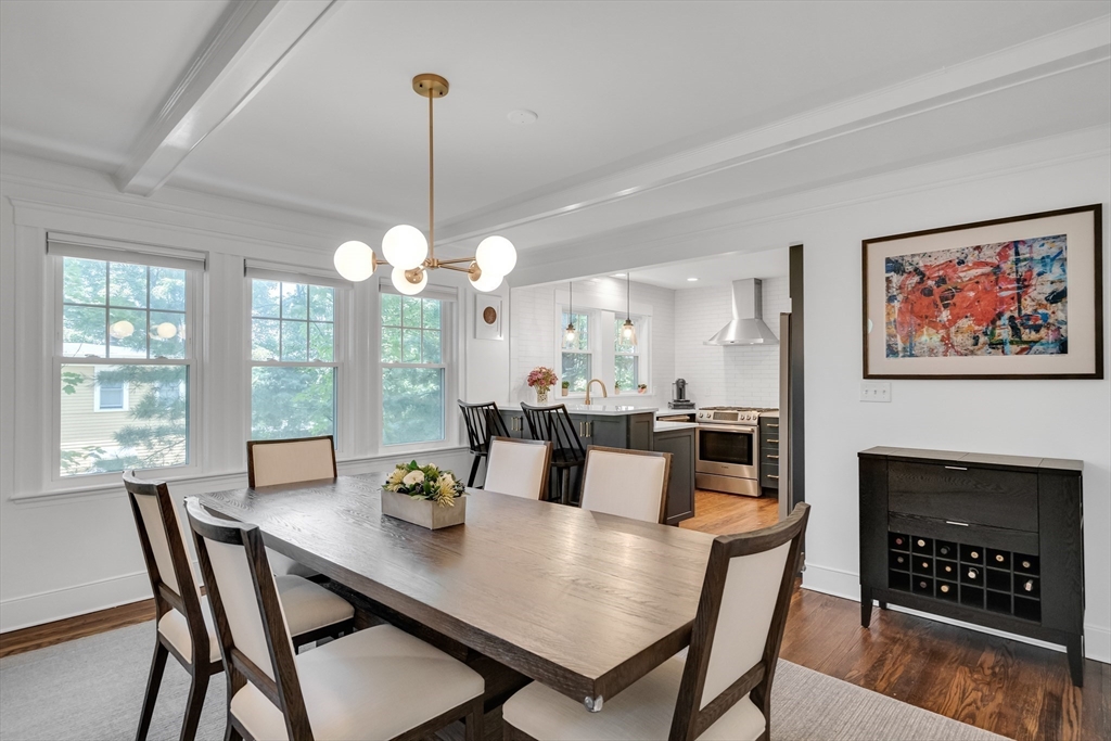 30 Perkins Street, Unit 1 Newton, MA 02465 - Photo 9 of 34 a view of a dining room with furniture window and wooden floor