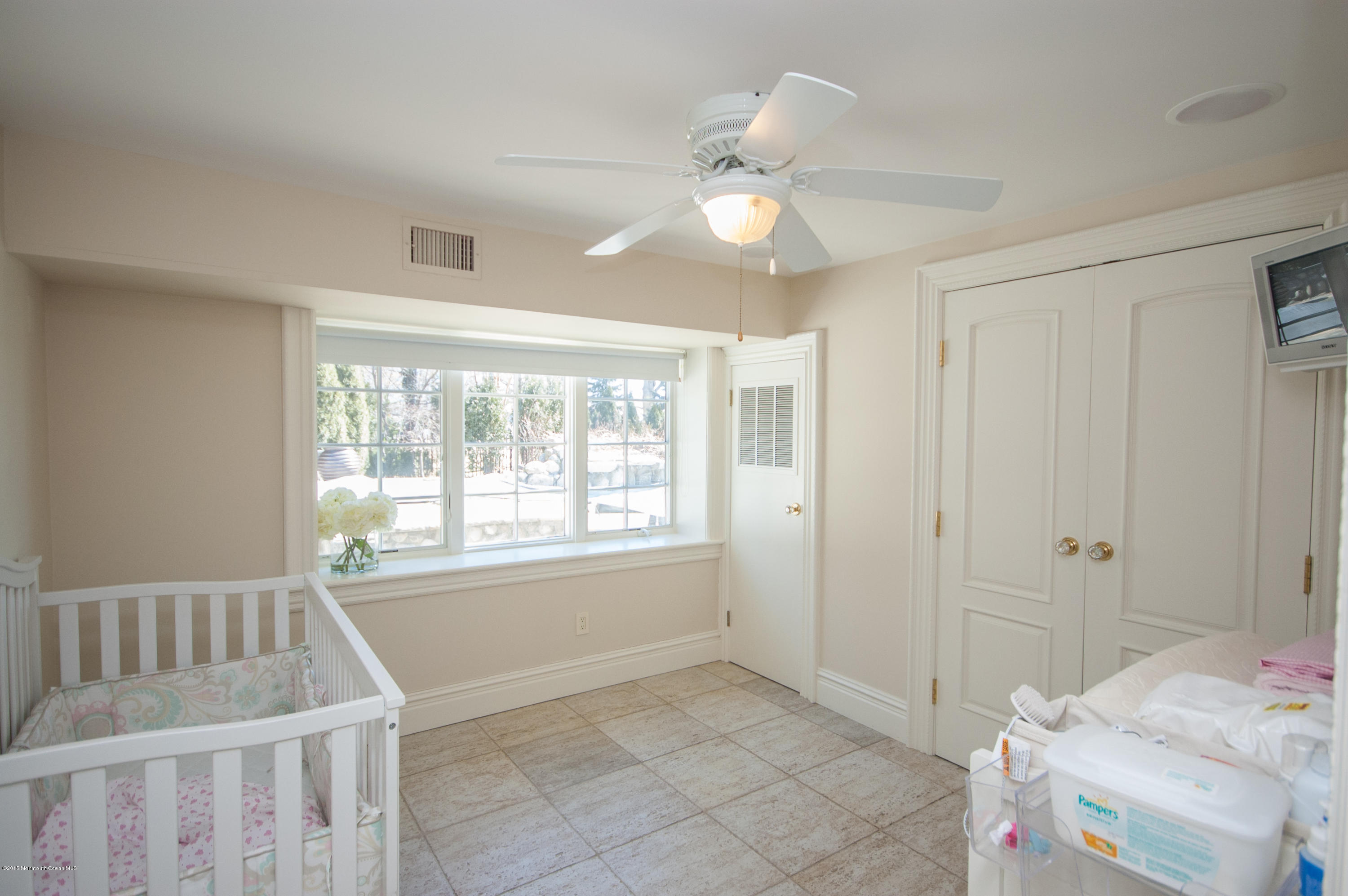 112 Hartshorne Road Middletown, NJ 07760 - Photo 40 of 86 a view of an empty room with a window