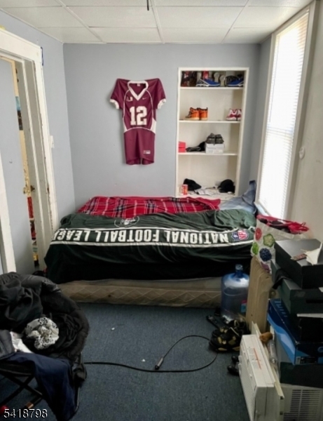 150 Atlanta Avenue Union, NJ 07088 - Photo 17 of 26 a room with furniture and a rug