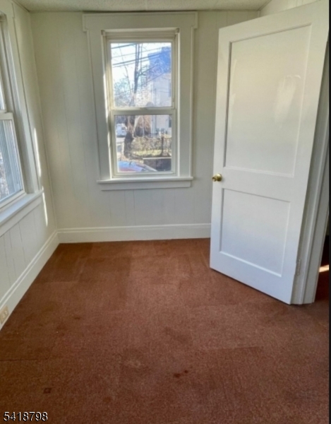 150 Atlanta Avenue Union, NJ 07088 - Photo 6 of 26 an empty room with windows and closet