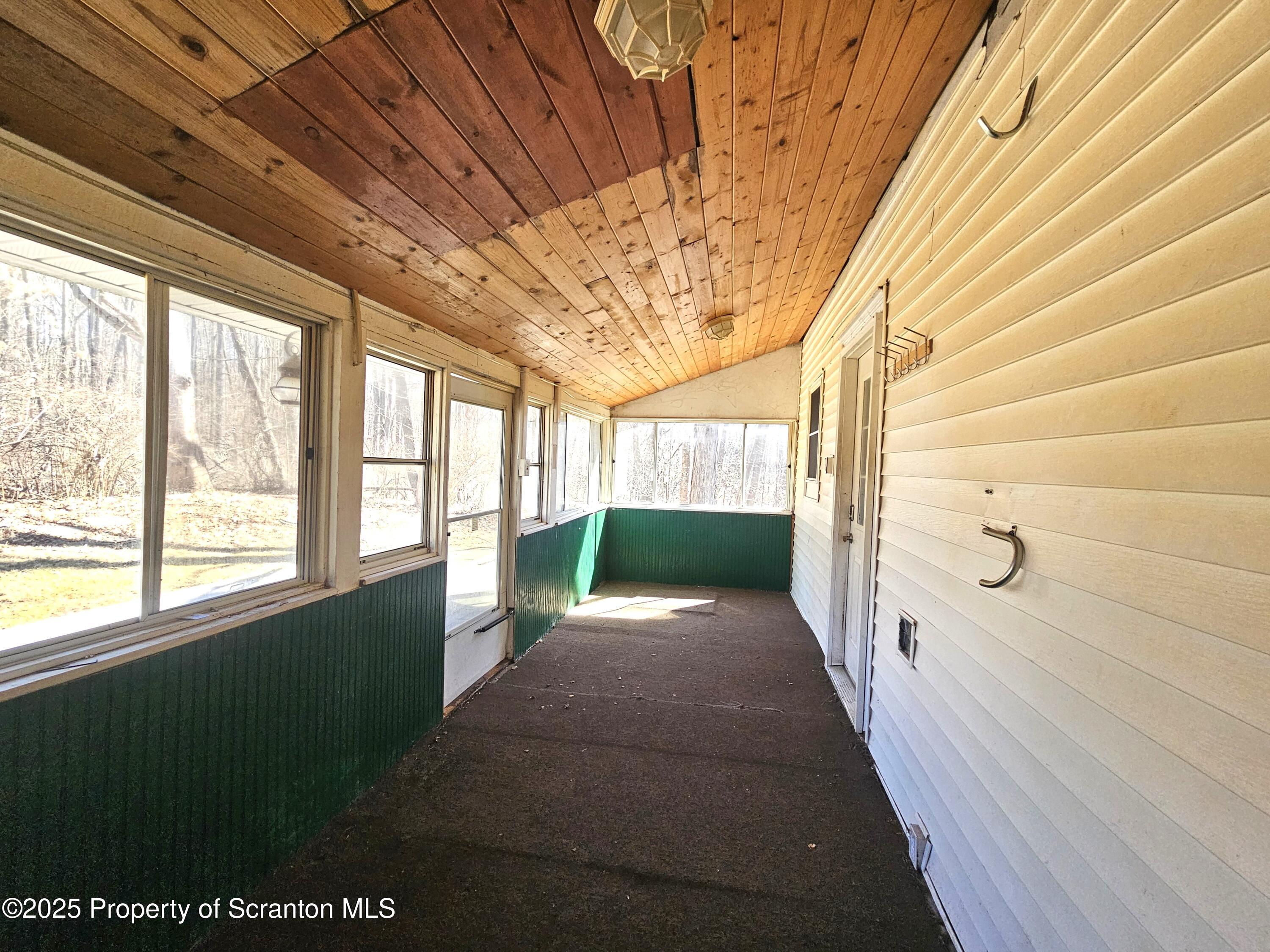 109-111 Griffin Pond Road Clarks Summit, PA 18411 - Photo 27 of 50 Enclosed Porch View 1