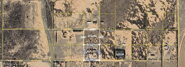 a view of residential house with wooden fence