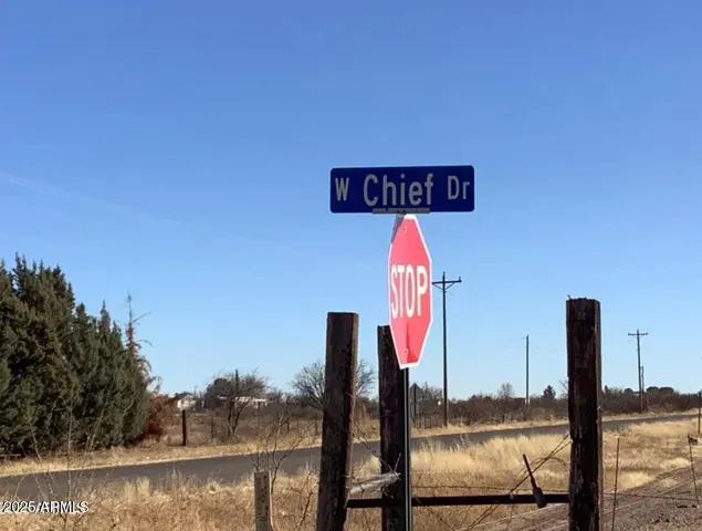 a view of a ocean with building in the background