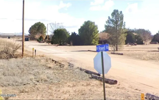 a view of a yard with an outdoor space