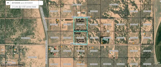 a bathroom with a glass door shower and a sink