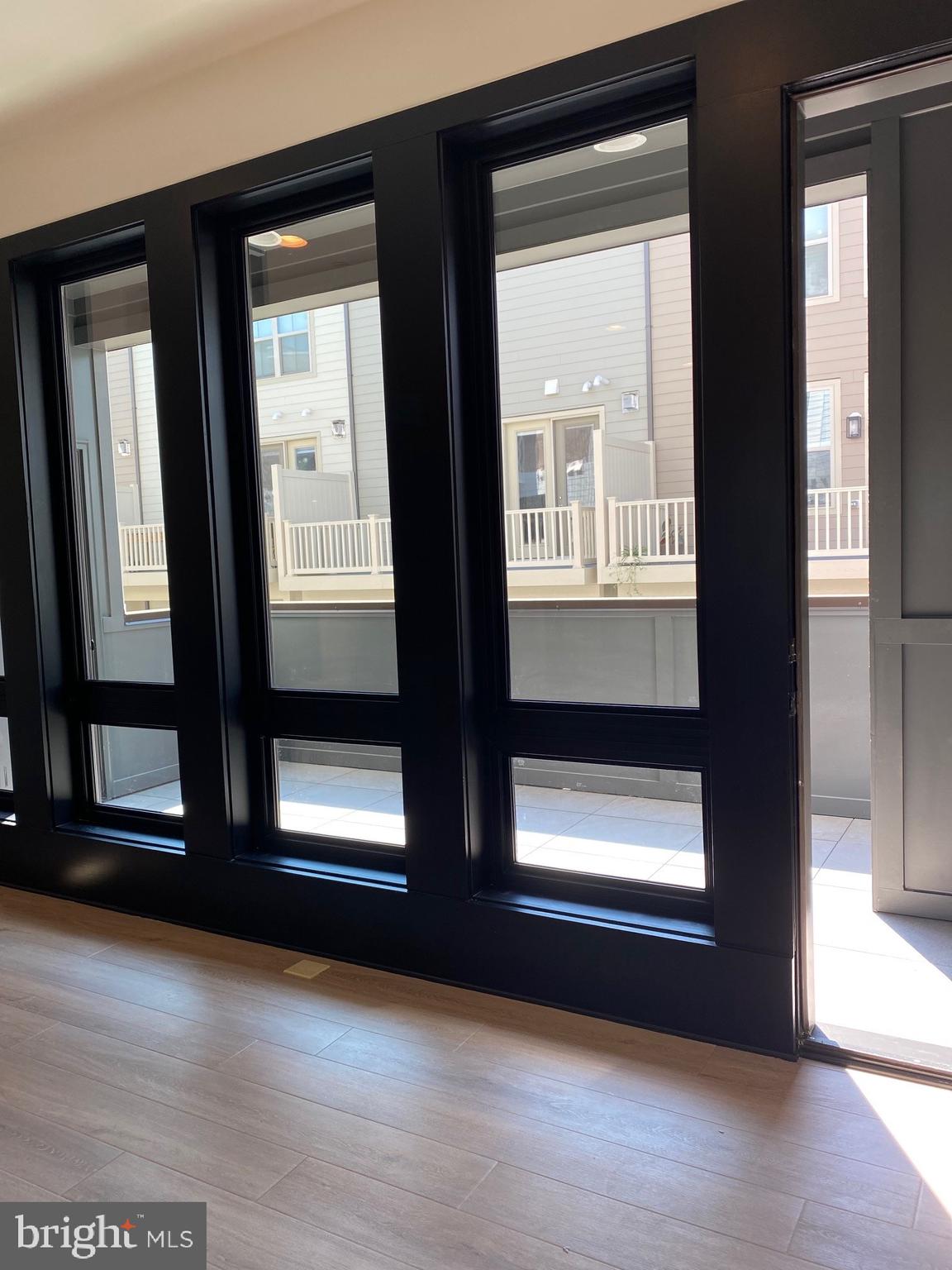14944 Dispatch Street, Unit 2 Rockville, MD 20850 - Photo 15 of 36 a view of an empty room and window