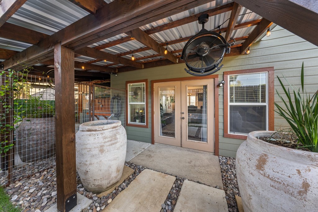 116 Jasper Lane North Kerrville, TX 78028 - Photo 19 of 27 a front view of a house with garden