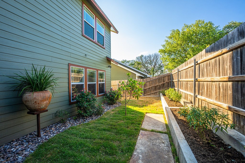 116 Jasper Lane North Kerrville, TX 78028 - Photo 20 of 27 a view of a house with a small yard
