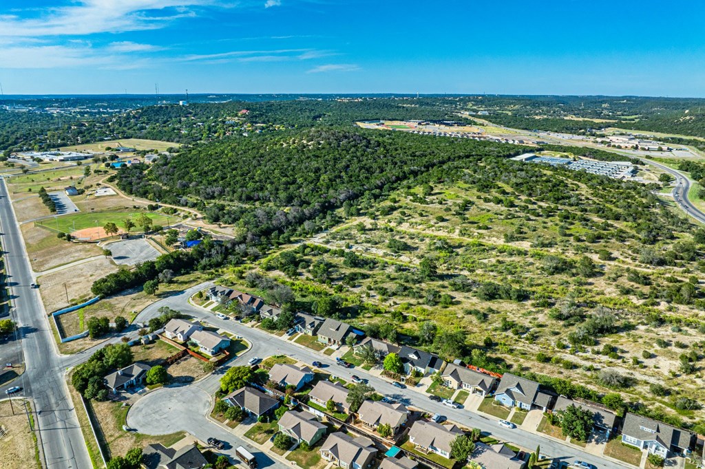 116 Jasper Lane North Kerrville, TX 78028 - Photo 21 of 27 an aerial view of residential houses with outdoor space