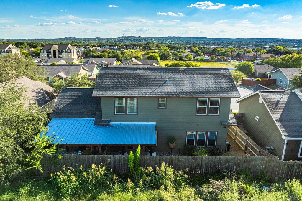 116 Jasper Lane North Kerrville, TX 78028 - Photo 23 of 27 an aerial view of a house with a yard and lake view