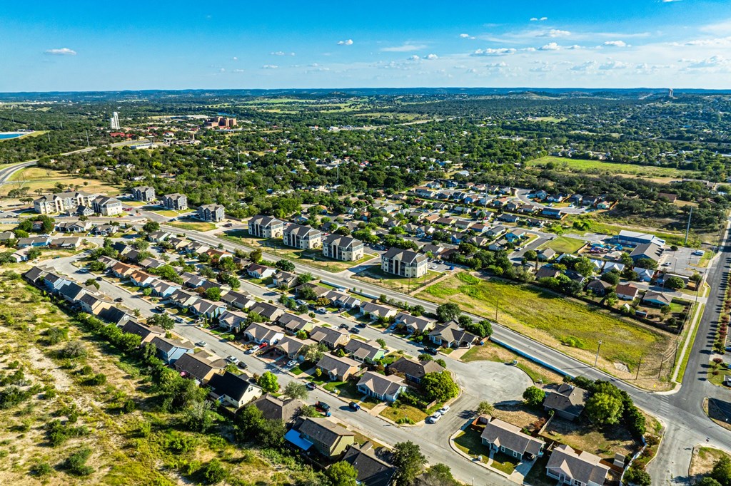 116 Jasper Lane North Kerrville, TX 78028 - Photo 25 of 27 an aerial view of residential building and ocean