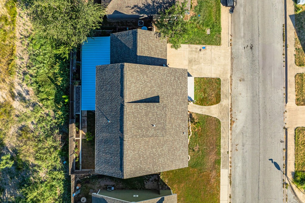 116 Jasper Lane North Kerrville, TX 78028 - Photo 26 of 27 aerial view of a house with a tree
