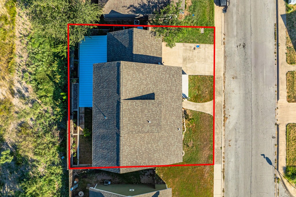 116 Jasper Lane North Kerrville, TX 78028 - Photo 27 of 27 aerial view of a house with a swimming pool