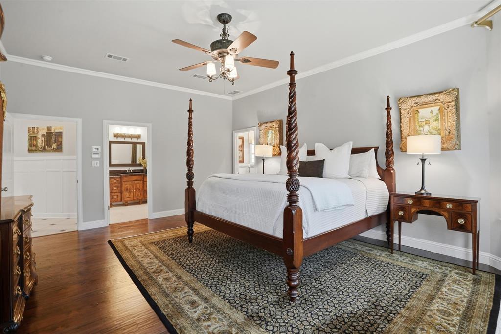 9651 Yellow Rose Lane Pilot Point, TX 76258 - Photo 19 of 38 a bedroom with a bed lamps and table