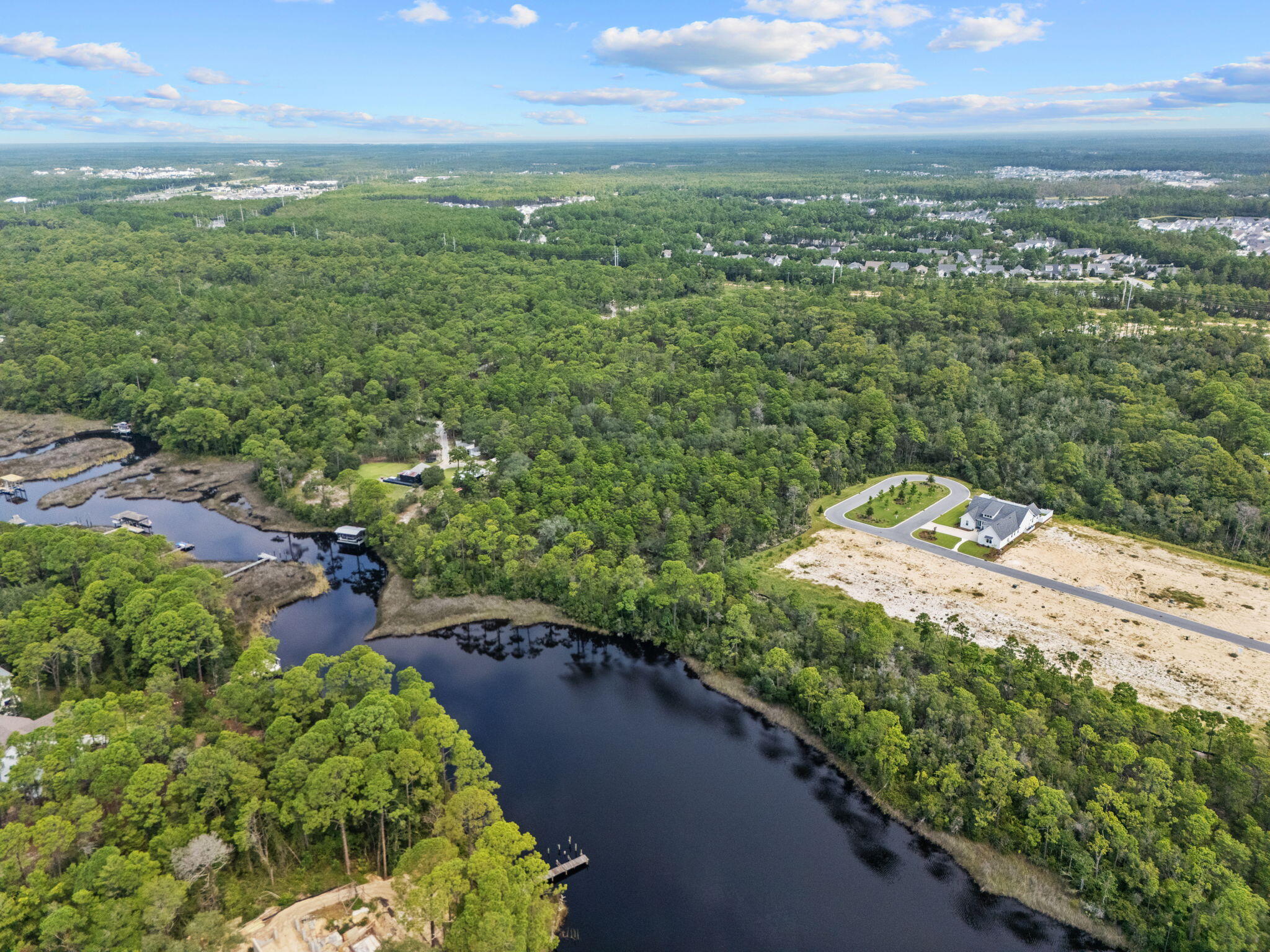Lot 17 East Rattlesnake Trail Inlet Beach Inlet Beach, FL 32461 - Photo 3 of 10 a view of a city with an ocean