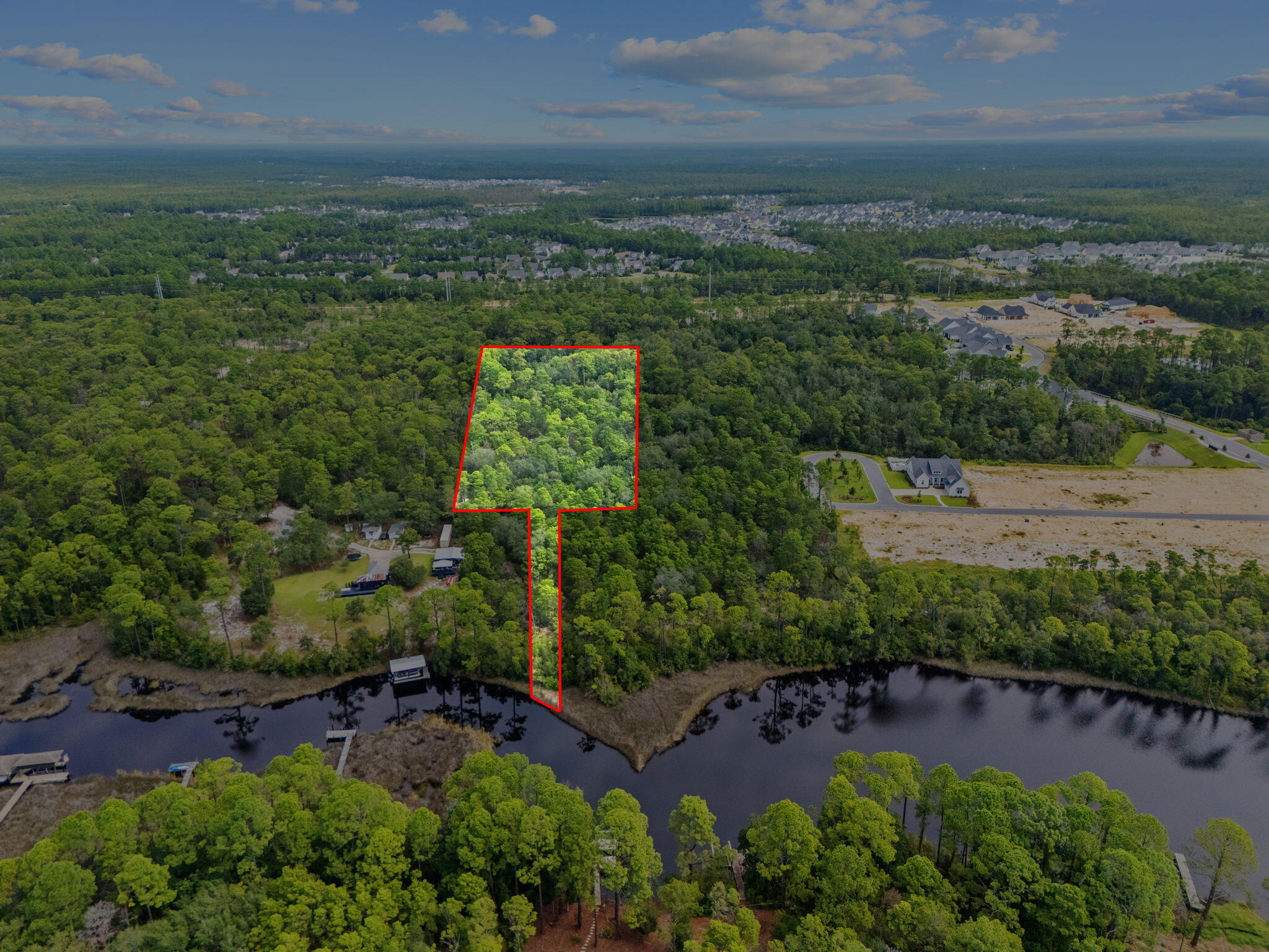 Lot 17 East Rattlesnake Trail Inlet Beach Inlet Beach, FL 32461 - Photo 4 of 10 an aerial view of a houses with outdoor space