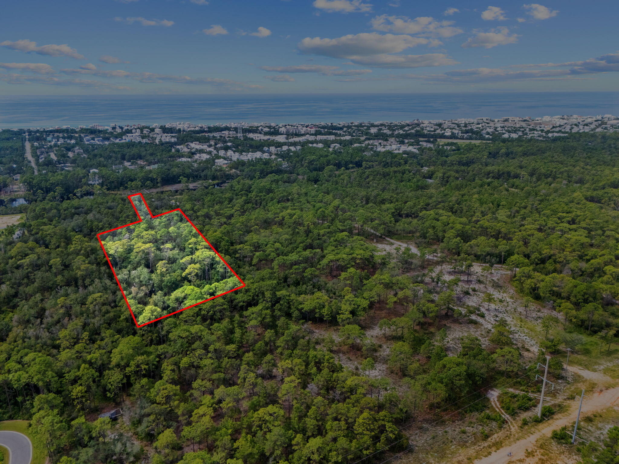 Lot 17 East Rattlesnake Trail Inlet Beach Inlet Beach, FL 32461 - Photo 9 of 10 an aerial view of a city