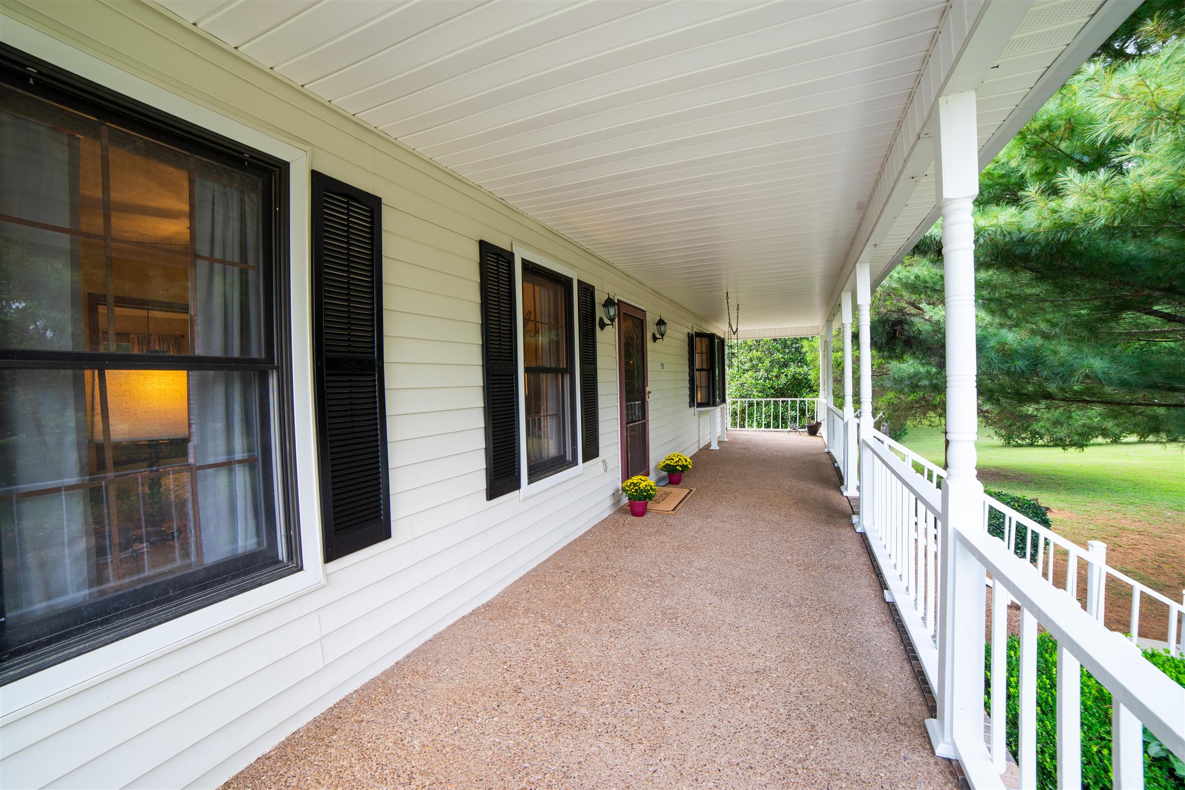 2190 Glencoe Road Culleoka, TN 38451 - Photo 3 of 30 Covered Front Porch with plenty of shade and privacy to sit out and enjoy a morning coffee.