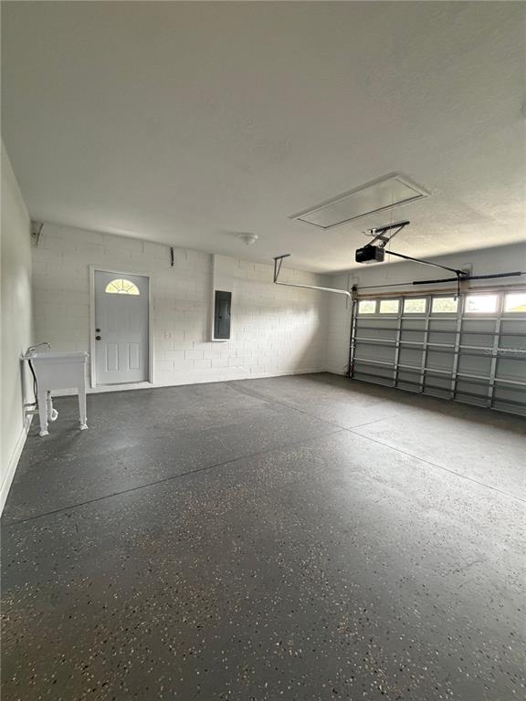 413 Britten Drive Kissimmee, FL 34758 - Photo 19 of 20 a view of a garage with furniture