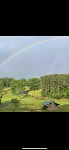 a view of a lake with a mountain