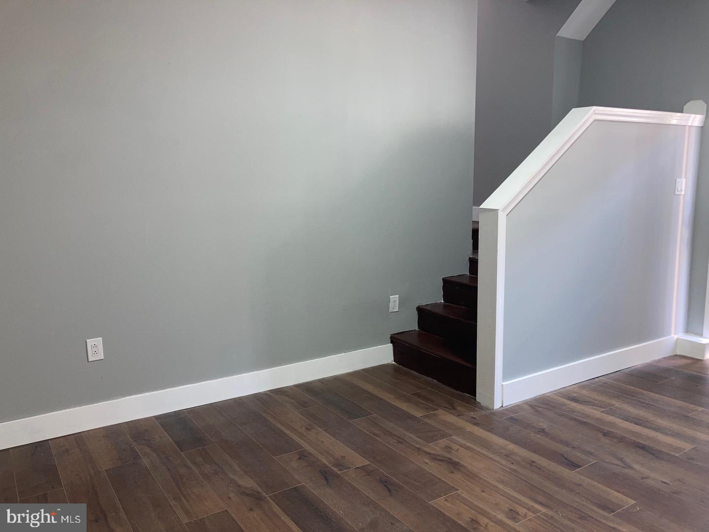 1815 South 23rd Street, Unit 1 Philadelphia, PA 19145 - Photo 11 of 13 a view of a hallway with wooden floor and entryway