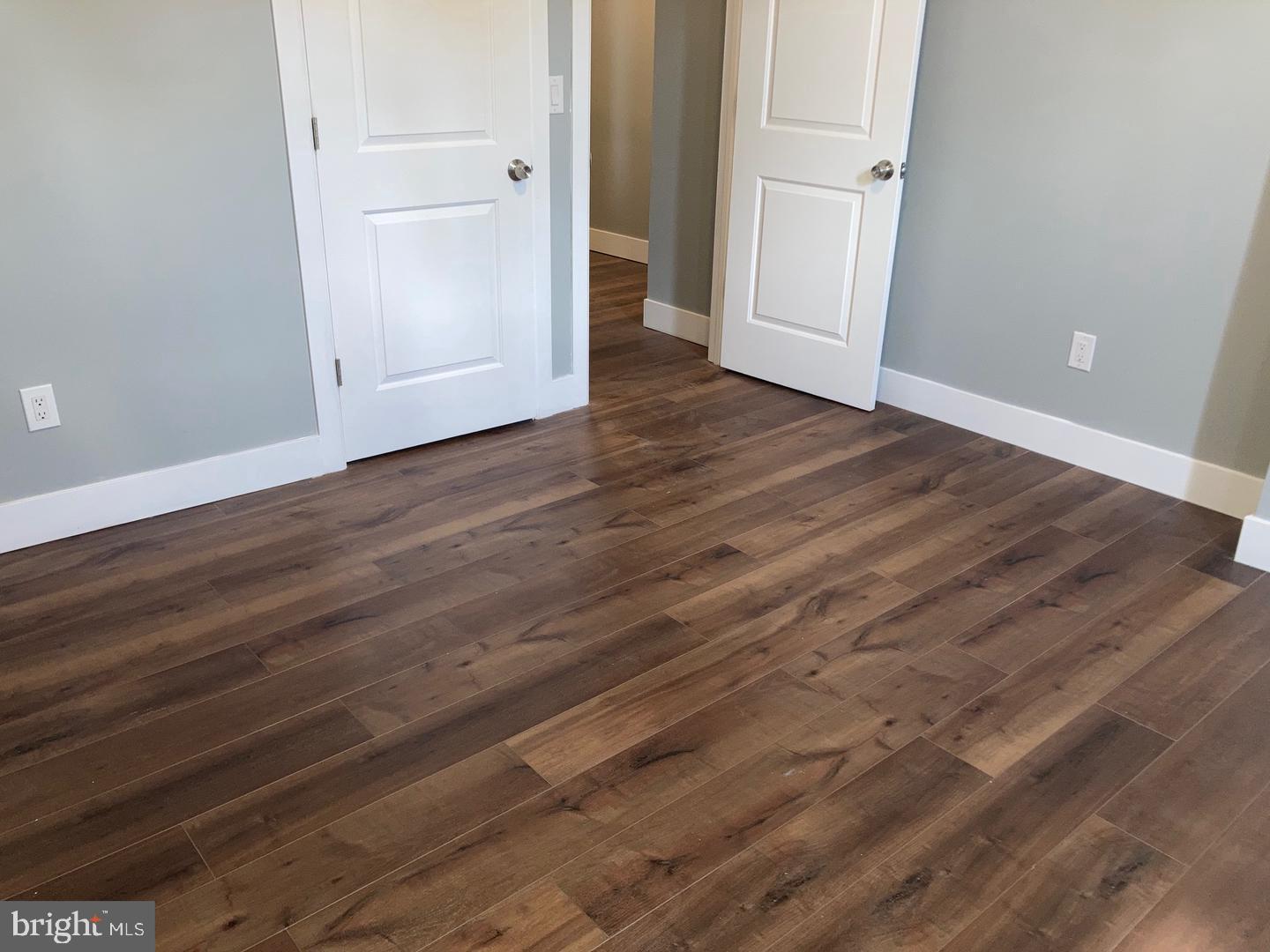 1815 South 23rd Street, Unit 1 Philadelphia, PA 19145 - Photo 2 of 13 a view of an empty room with wooden floor