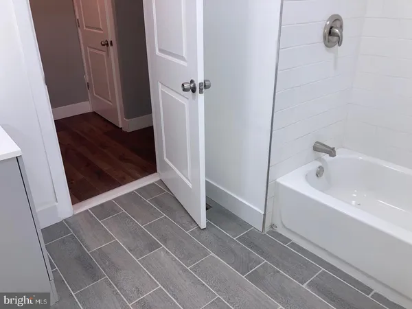 a bathroom with a bathtub
