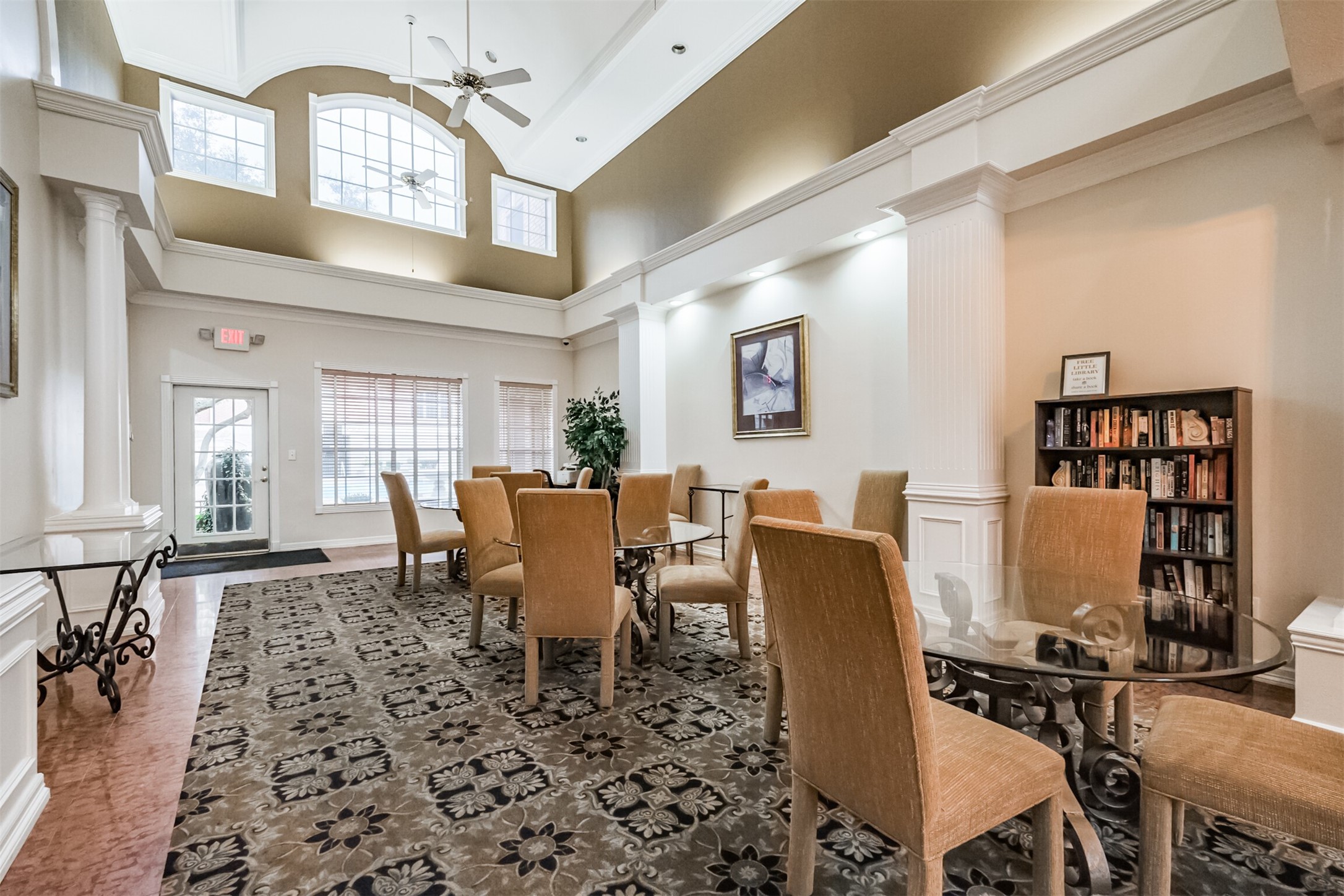 2111 Welch Street, Unit B304 Houston, TX 77019 - Photo 34 of 37 a dining room with furniture a rug and wooden floor