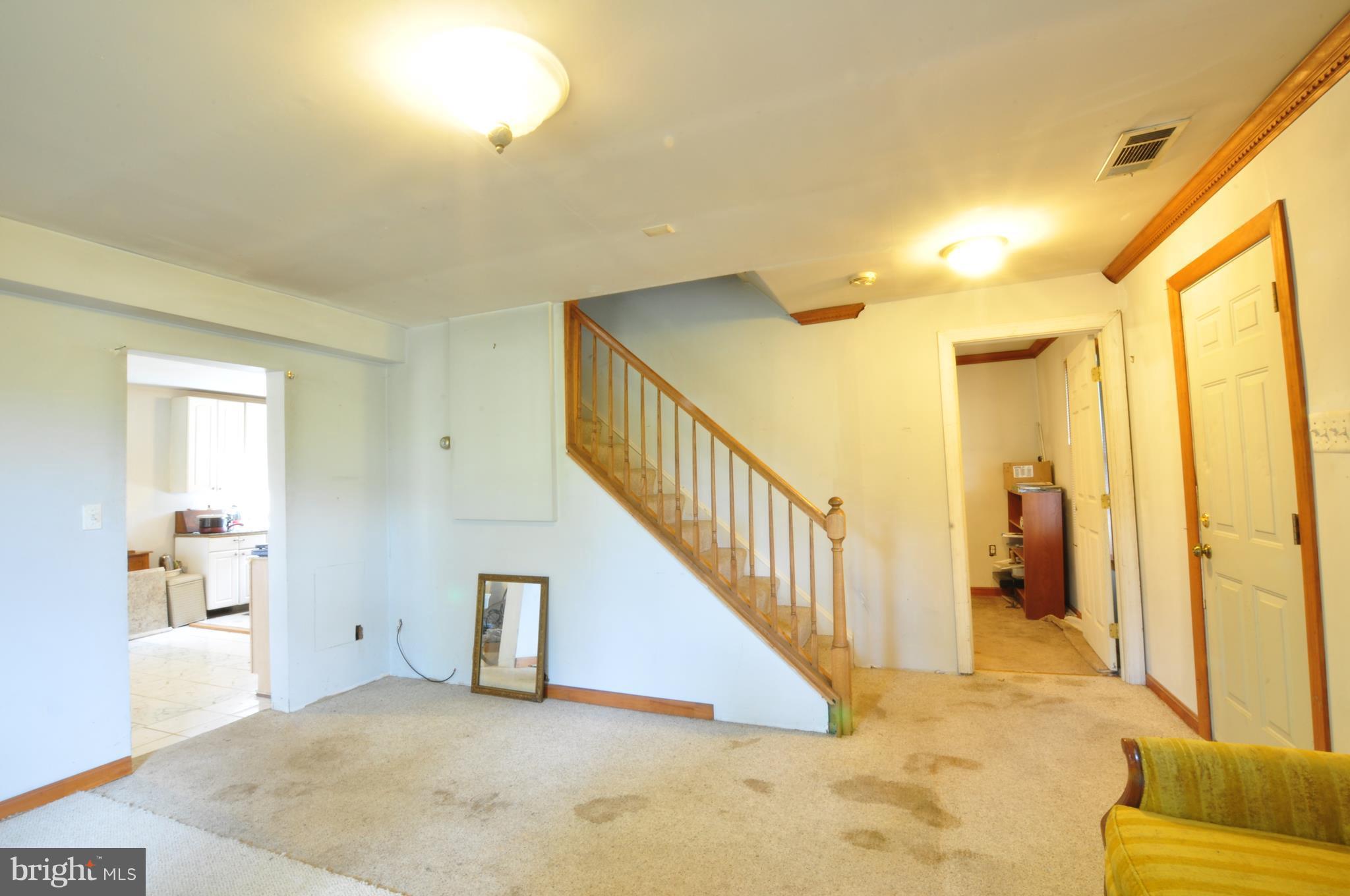 24115 Stringtown Road Clarksburg, MD 20871 - Photo 4 of 10 Living Room with Den to Right