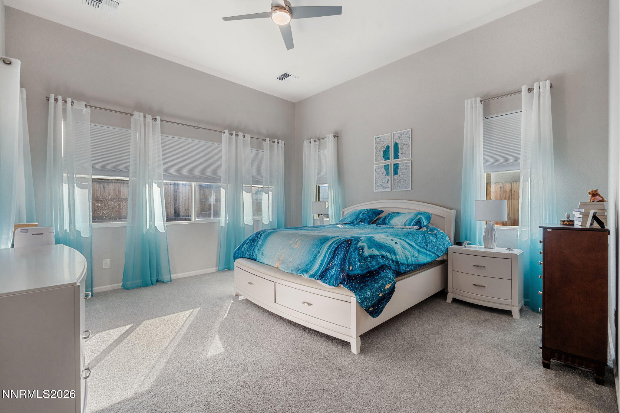 2370 Buttermere Drive Reno, NV 89521 - Photo 18 of 37 a bedroom with a bed and a window