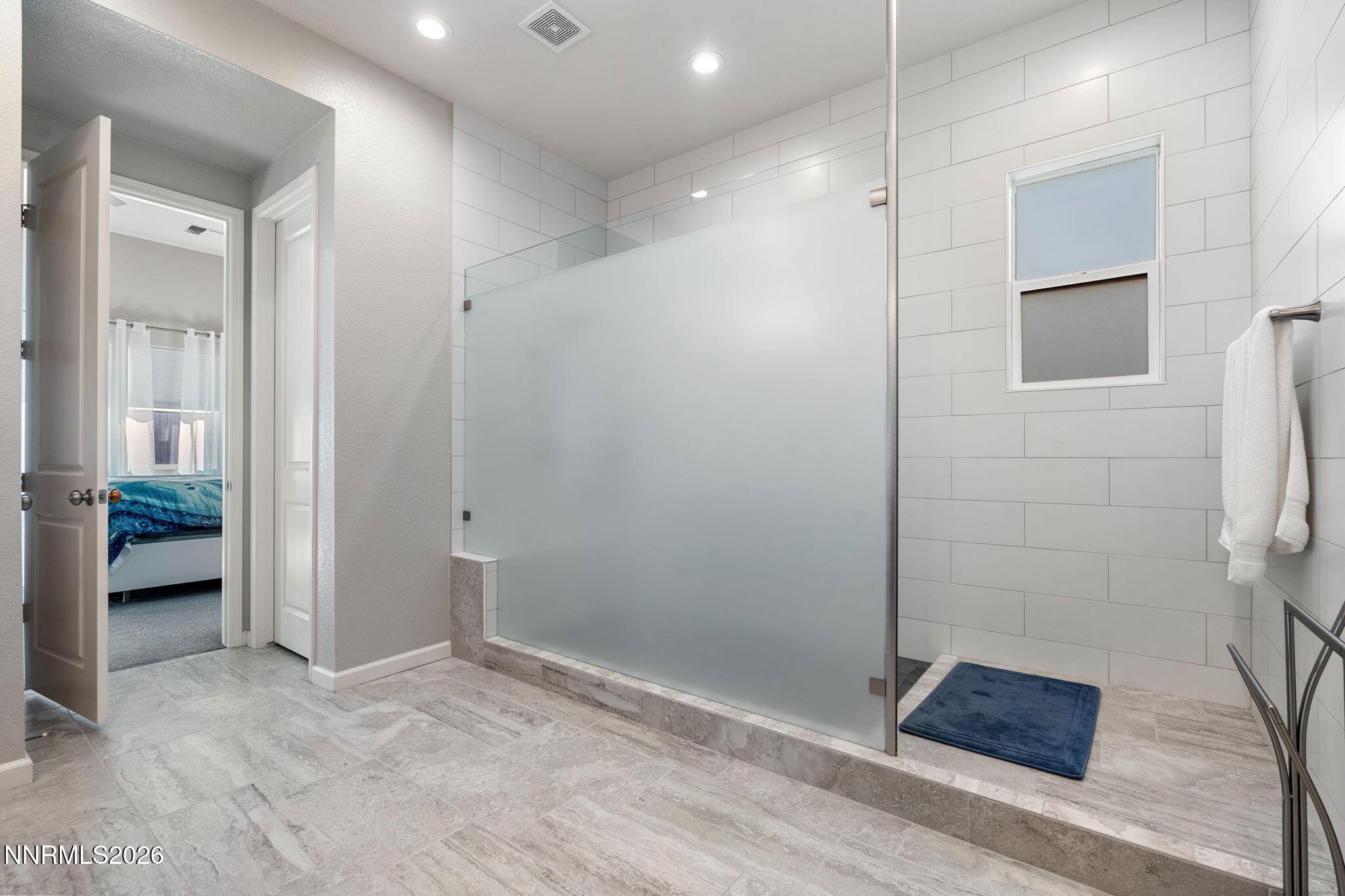 2370 Buttermere Drive Reno, NV 89521 - Photo 22 of 37 a view of hallway with a livingroom and a chandelier
