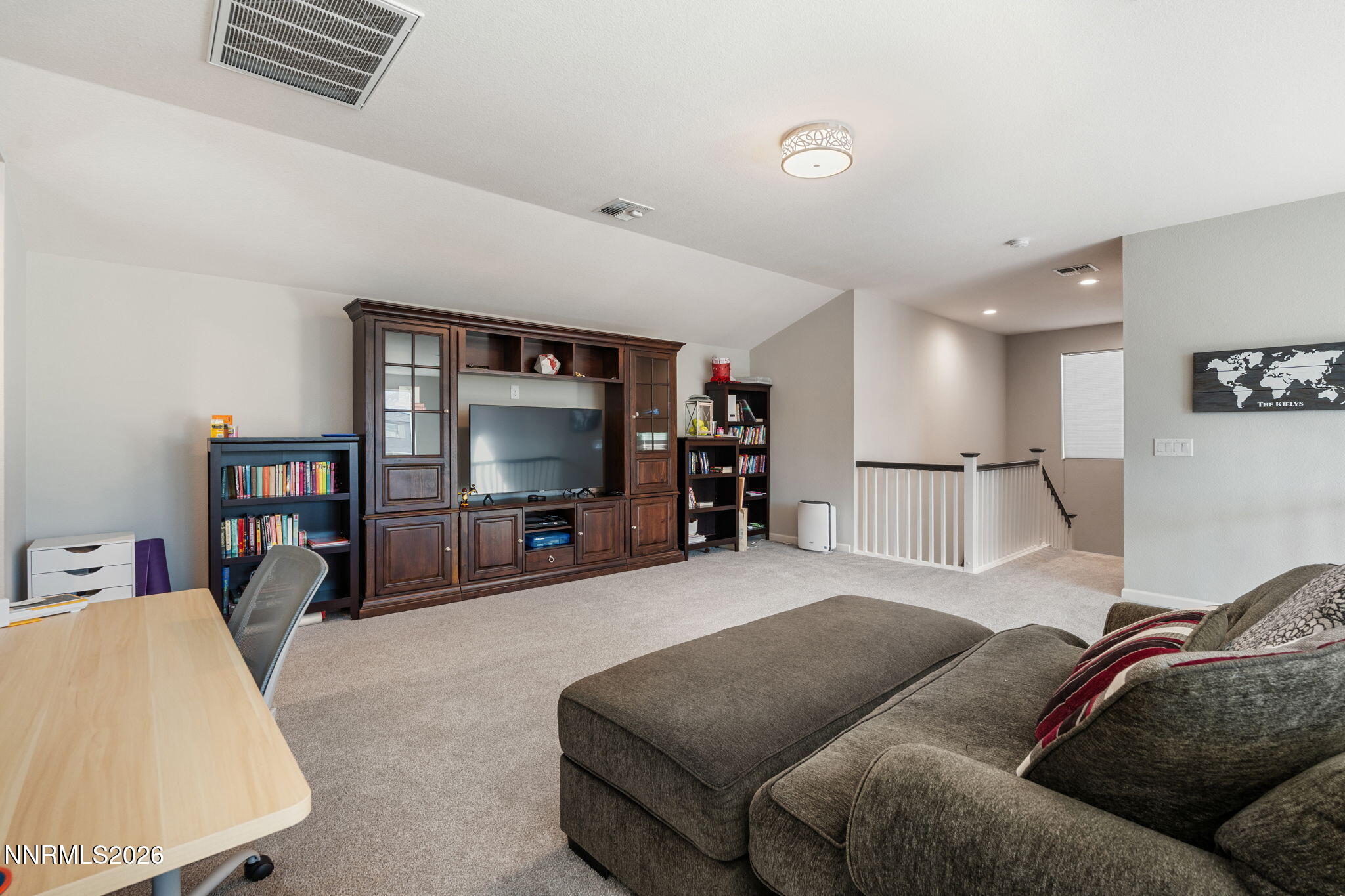 2370 Buttermere Drive Reno, NV 89521 - Photo 25 of 37 a living room with furniture and a flat screen tv