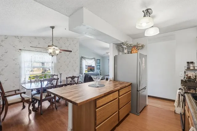 a bed room with a bed and a dresser