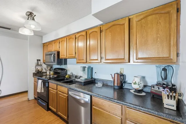 a bedroom with a large bed and a large window