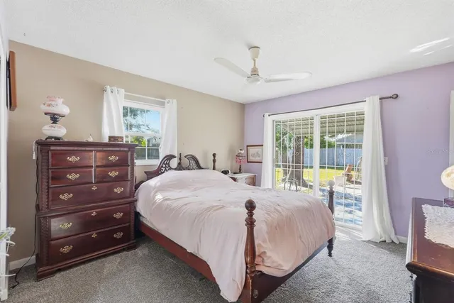 a bathroom with a sink mirror vanity and toilet