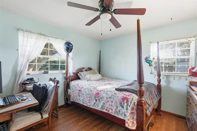 a view of a house with swimming pool and a yard