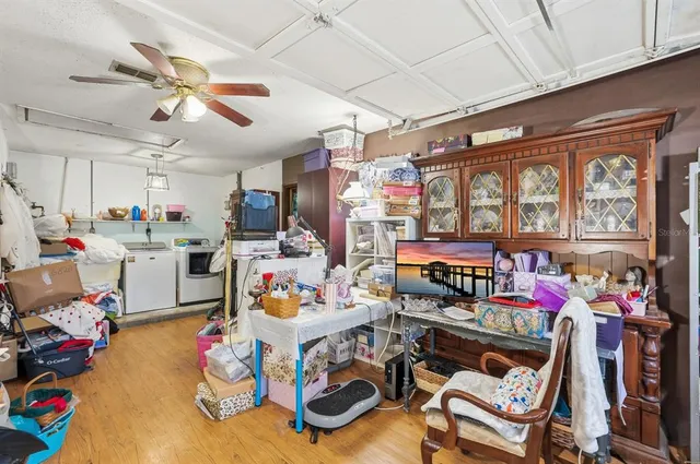 an aerial view of a houses with a yard