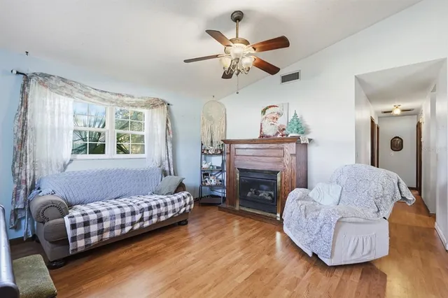 a view of a dining room with furniture and window